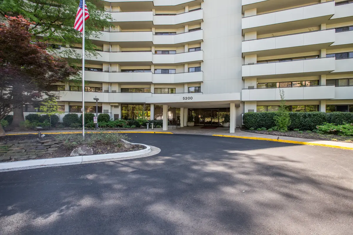 Building exterior photo of The Carlyle House condo building on Columbia Pike in Arlington, VA.