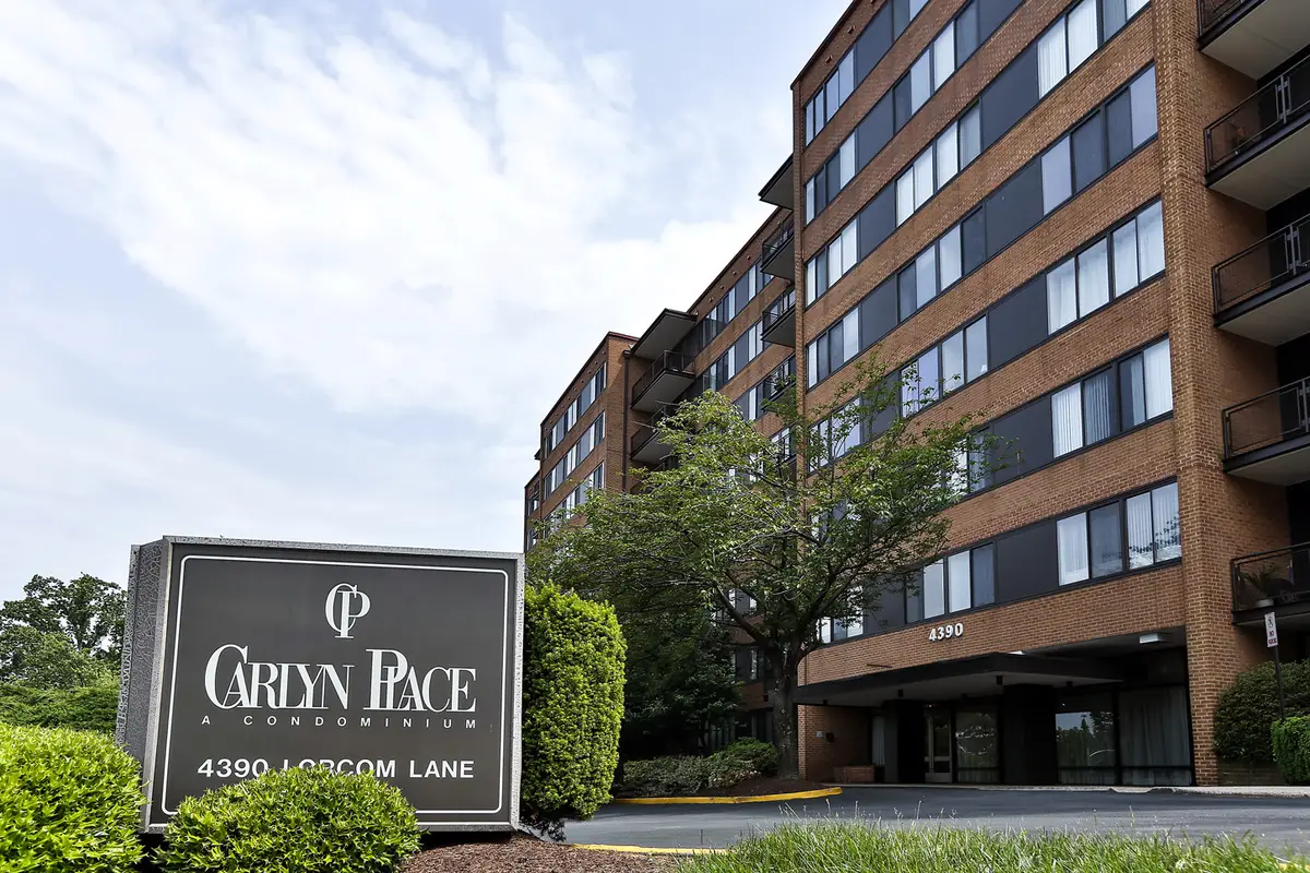 Exterior view of Carlyn Place condo building on Langston Blvd in Arlington, VA