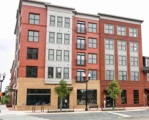 Building exterior photo of Columbia Place condominiums on Columbia Pike in Arlington, VA.