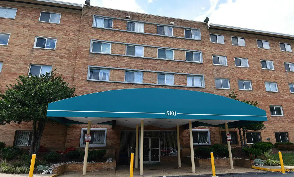 Exterior view of Columbia Knolls condo building on Columbia Pike in Arlington, VA