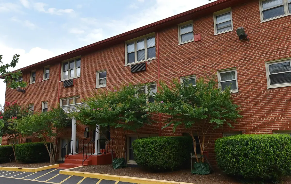 Exterior view of Dominion Terrace condo building on Langston Blvd in Arlington, VA.