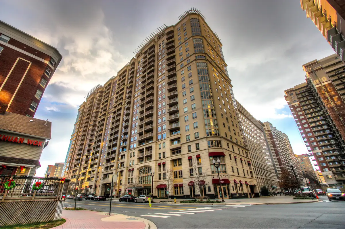 Building exterior photo of Liberty Center condominiums in Ballston, Arlington, VA.