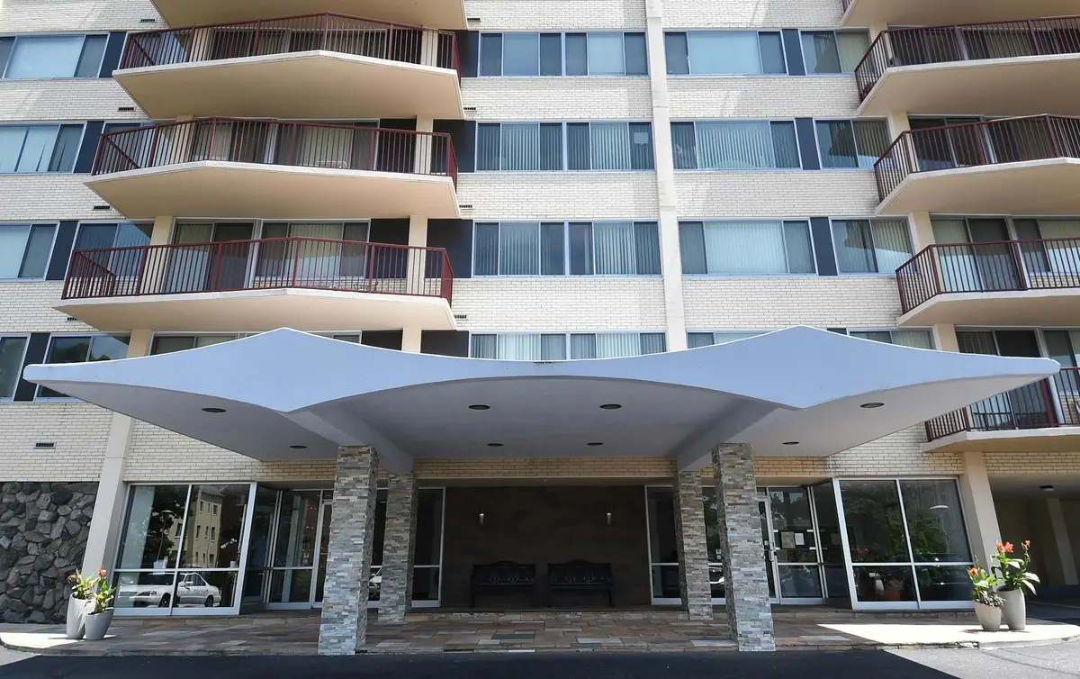 Building exterior photo of The Palazzo condo building on Columbia Pike in Arlington, VA.