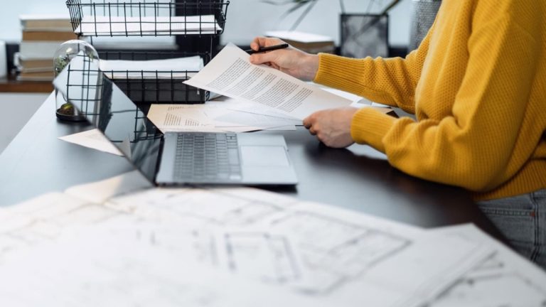 Arlington condo seller reviewing HOA reserve and insurance documents before listing under new Fannie Mae rules