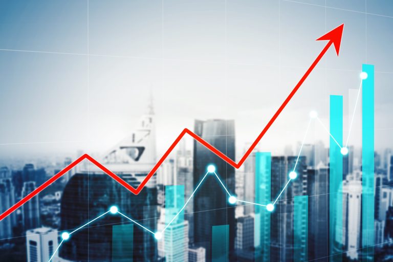 Rising graph over city skyline background